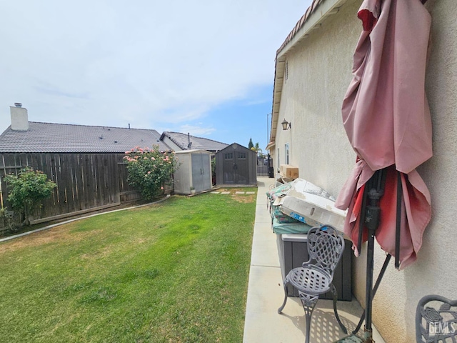 4102 Sierra Redwood Dr, Bakersfield, CA 93313 - fenced backyard with a storage unit
