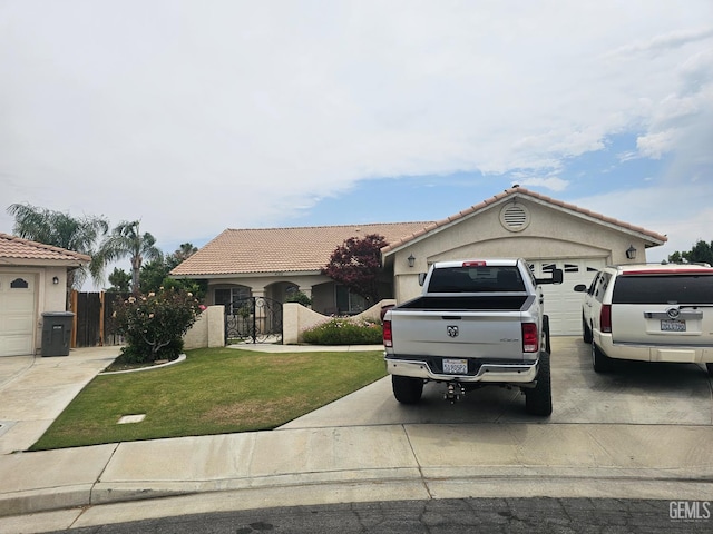 4102 Sierra Redwood Dr, Bakersfield, CA 93313 - view of front of house featuring driveway, a garage, a gate, and stucco siding