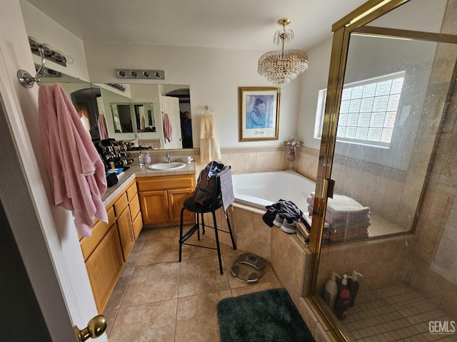 4102 Sierra Redwood Dr, Bakersfield, CA 93313 - full bath featuring vanity, a bath, a shower stall, tile patterned floors, and a chandelier