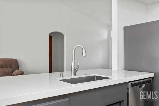 kitchen with stainless steel dishwasher and sink