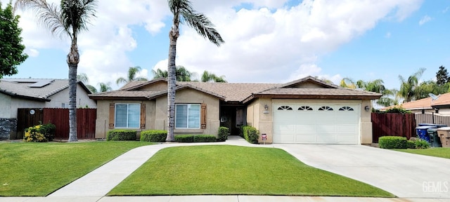 5308 Benevento Ct, Bakersfield, CA 93308 - ranch-style home featuring a front lawn, concrete driveway, fence, a garage, and stucco siding