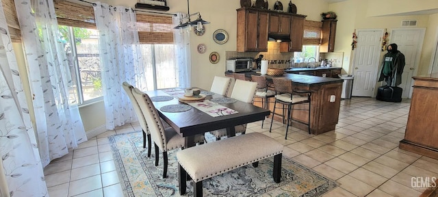 5308 Benevento Ct, Bakersfield, CA 93308 - dining room featuring a toaster, visible vents, and light tile patterned floors