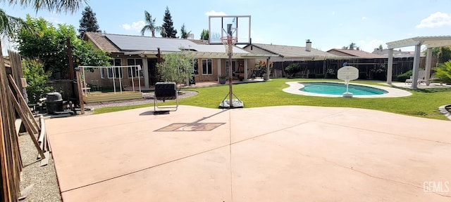 5308 Benevento Ct, Bakersfield, CA 93308 - view of swimming pool featuring a pergola, a lawn, a fenced backyard, and a patio