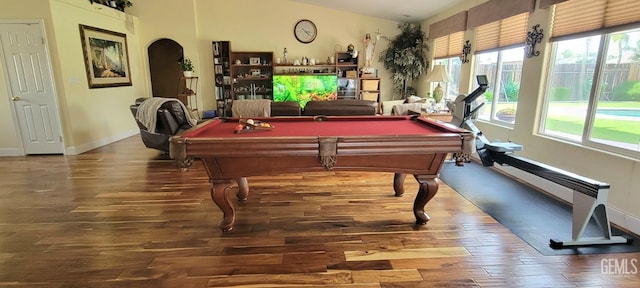 5308 Benevento Ct, Bakersfield, CA 93308 - playroom featuring arched walkways, wood finished floors, pool table, and baseboards