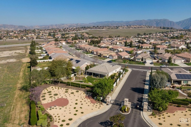 aerial view with a mountain view and a residential view