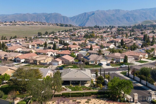 aerial view featuring a residential view and a mountain view