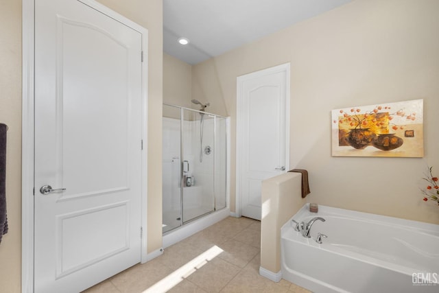 full bathroom featuring tile patterned flooring, baseboards, recessed lighting, a stall shower, and a bath