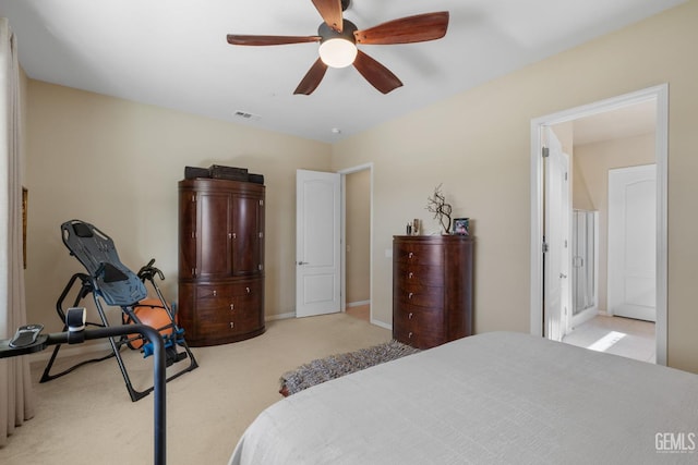 bedroom featuring light carpet, visible vents, baseboards, and a ceiling fan