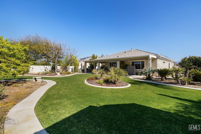 view of yard with a patio and fence