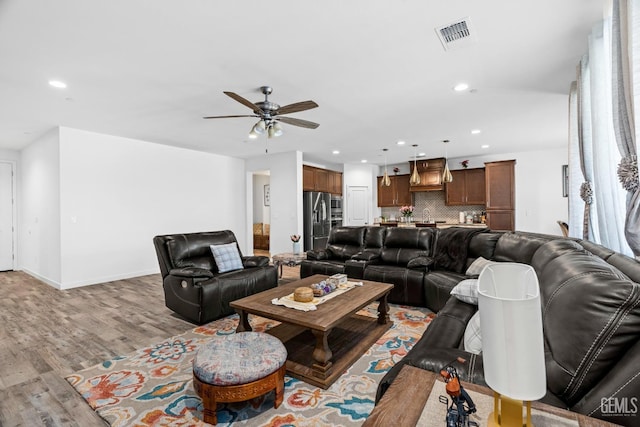 7900 Linden Tree Ave, Bakersfield, CA 93313 - living area with recessed lighting, light wood-type flooring, visible vents, and ceiling fan