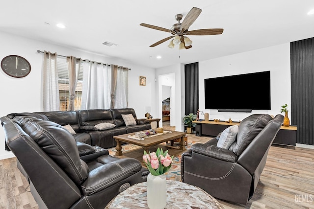 7900 Linden Tree Ave, Bakersfield, CA 93313 - living area with ceiling fan, recessed lighting, visible vents, and light wood-style flooring