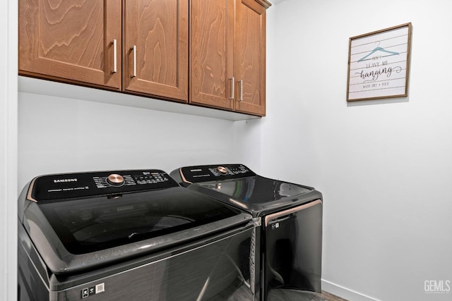 7900 Linden Tree Ave, Bakersfield, CA 93313 - laundry area with baseboards, cabinet space, and independent washer and dryer