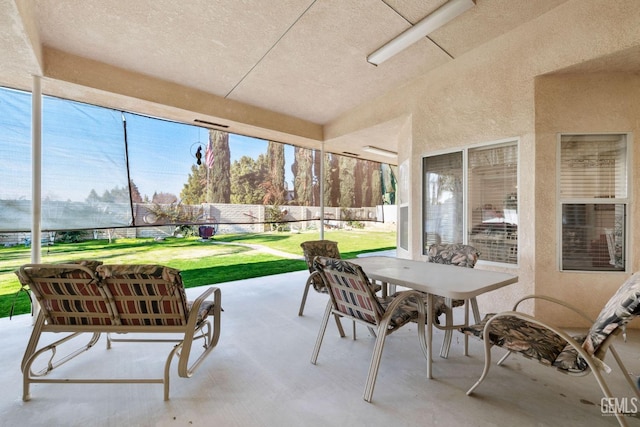 view of patio / terrace featuring outdoor dining space and fence