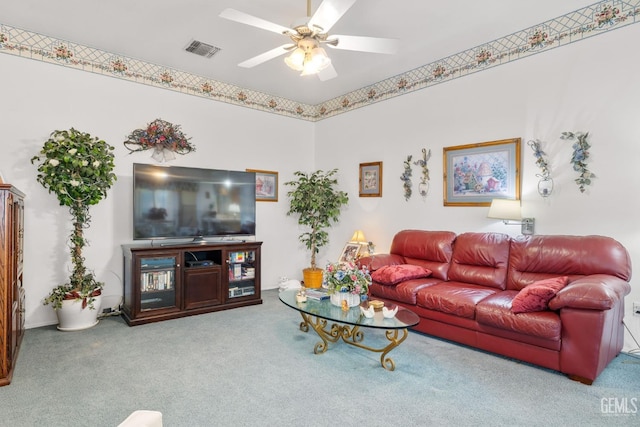 carpeted living room featuring visible vents and a ceiling fan