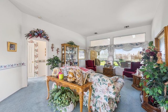 carpeted living room with visible vents