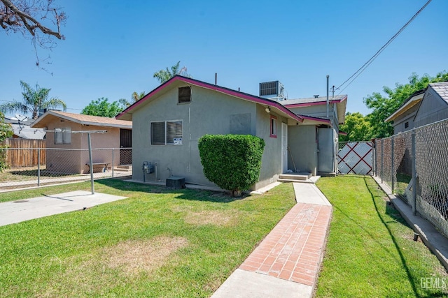 819 P St, Bakersfield, CA 93304 - bungalow-style house featuring a gate, stucco siding, and central AC unit