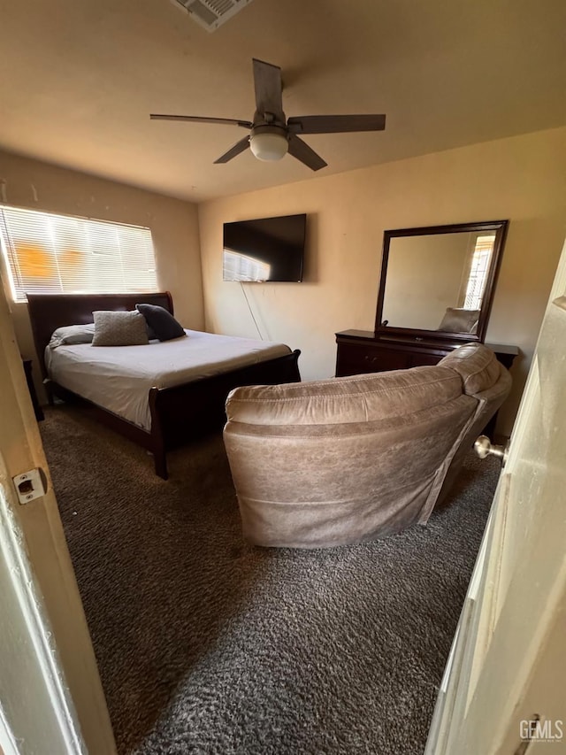 819 P St, Bakersfield, CA 93304 - carpeted bedroom featuring a ceiling fan