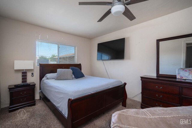 819 P St, Bakersfield, CA 93304 - carpeted bedroom featuring a ceiling fan