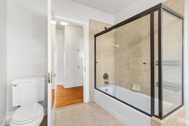 3007 Park Way, Bakersfield, CA 93304 - bathroom with toilet, enclosed tub / shower combo, and tile patterned floors