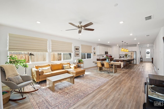 6713 Diamond Springs Dr, Bakersfield, CA 93313 - living room with ceiling fan, recessed lighting, and light wood-style floors
