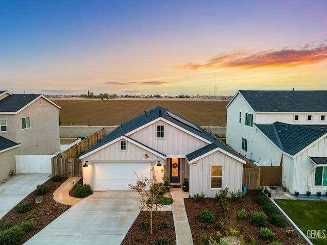 6713 Diamond Springs Dr, Bakersfield, CA 93313 - modern inspired farmhouse with board and batten siding, fence, concrete driveway, and an attached garage
