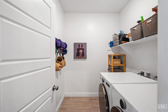 6713 Diamond Springs Dr, Bakersfield, CA 93313 - laundry area with washer and dryer, baseboards, and light wood-style flooring