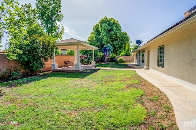 view of yard featuring a fenced backyard and a patio area