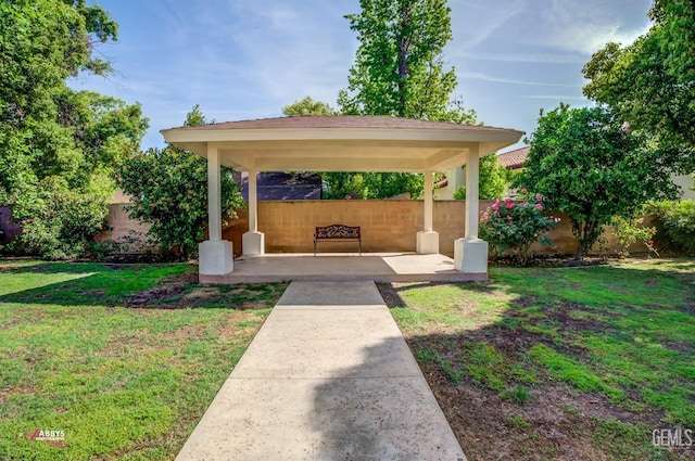 view of yard with a gazebo and a fenced backyard