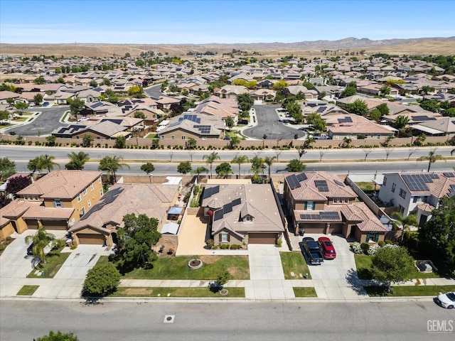 10002 Riata Ln, Bakersfield, CA 93306 - aerial perspective of suburban area with a mountainous background