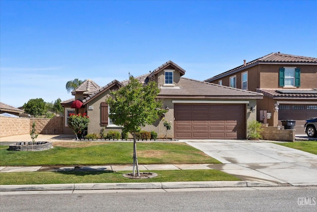 10002 Riata Ln, Bakersfield, CA 93306 - view of front of property with stucco siding, a tile roof, concrete driveway, and an attached garage