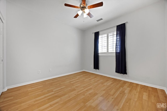 10002 Riata Ln, Bakersfield, CA 93306 - empty room with light wood-type flooring, a ceiling fan, and baseboards