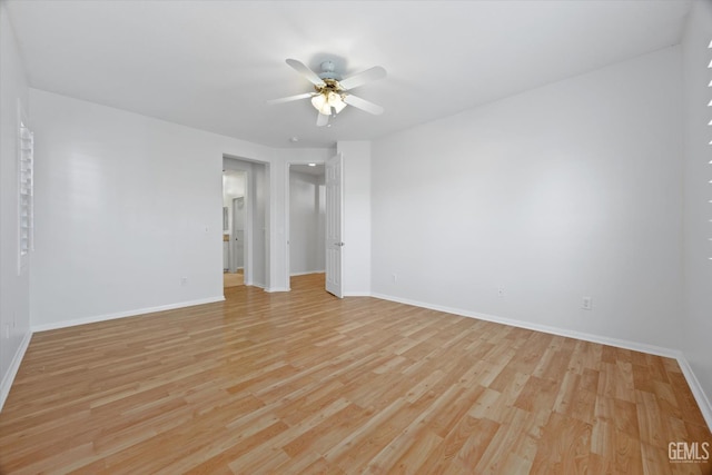 10002 Riata Ln, Bakersfield, CA 93306 - unfurnished room with a ceiling fan, baseboards, and light wood-style floors