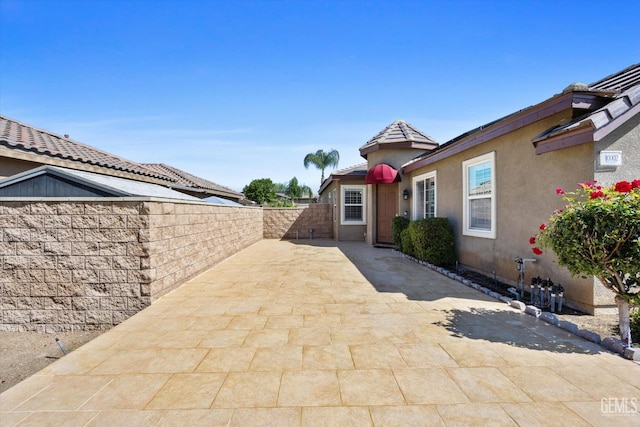 10002 Riata Ln, Bakersfield, CA 93306 - fenced backyard with a patio area