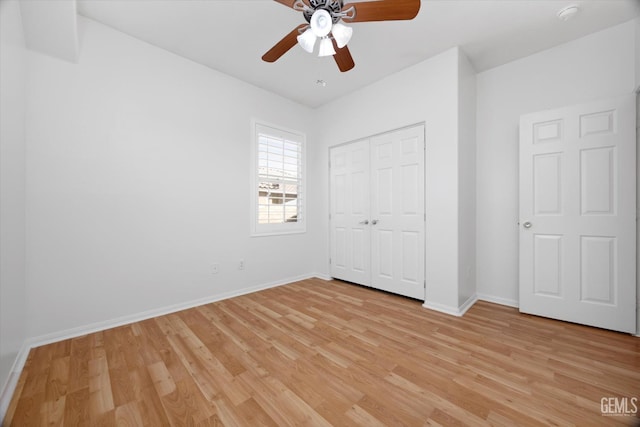 10002 Riata Ln, Bakersfield, CA 93306 - unfurnished bedroom with light wood finished floors, baseboards, a closet, and ceiling fan