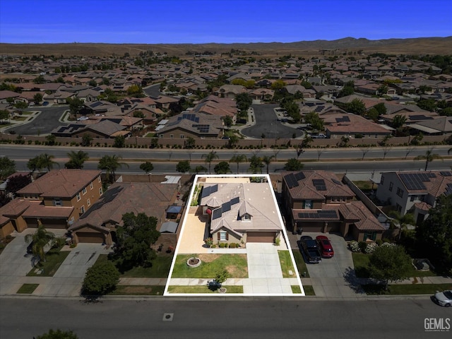 10002 Riata Ln, Bakersfield, CA 93306 - aerial view of residential area with property boundaries highlighted and mountains