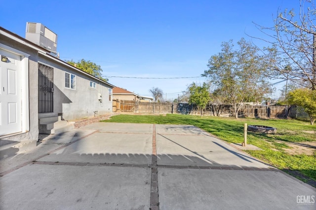 exterior space featuring a patio area and a fenced backyard