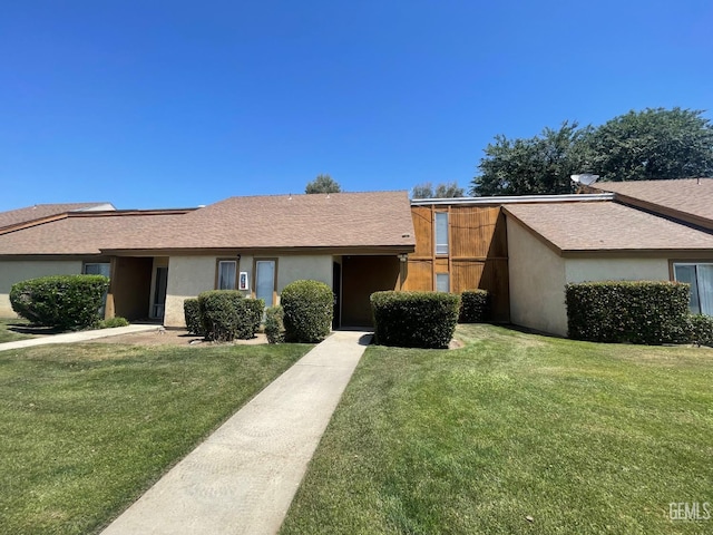 5000 Nordic Dr Unit 3, Bakersfield, CA 93309 - ranch-style home featuring a front lawn and stucco siding