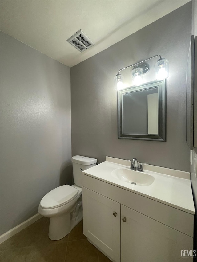5000 Nordic Dr Unit 3, Bakersfield, CA 93309 - bathroom featuring vanity, tile patterned flooring, toilet, and baseboards