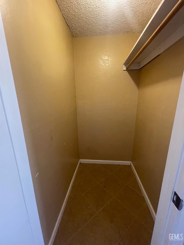 5000 Nordic Dr Unit 3, Bakersfield, CA 93309 - spacious closet featuring dark tile patterned floors