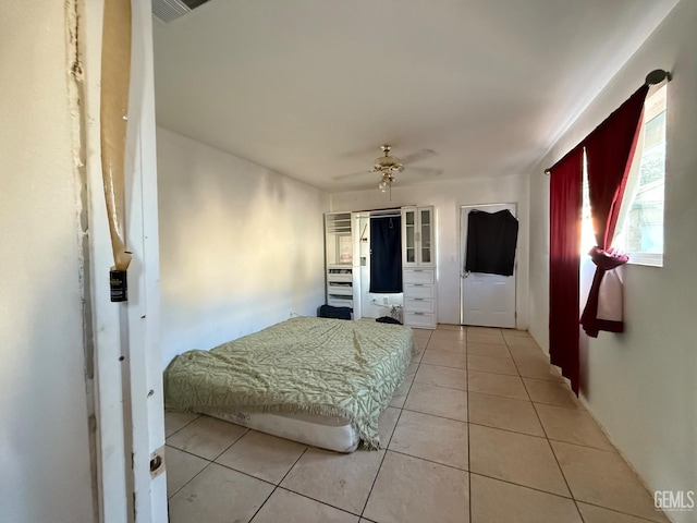 1218 Water St 0, Bakersfield, CA 93305 - bedroom with tile patterned flooring, a ceiling fan, and fridge