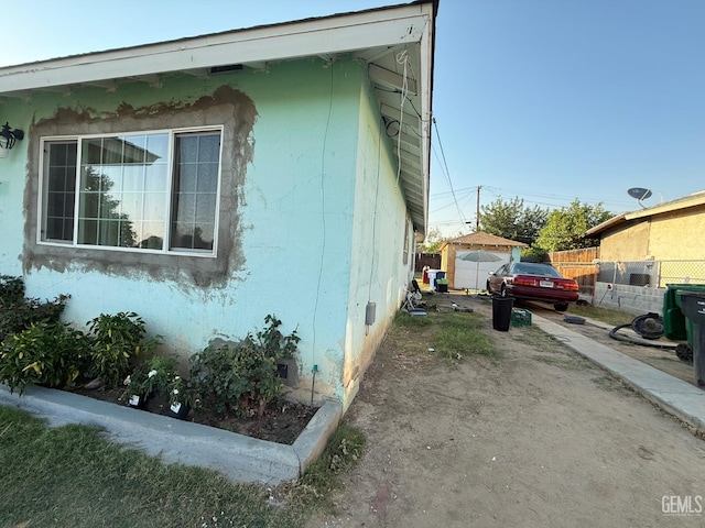 1218 Water St 0, Bakersfield, CA 93305 - view of side of home with dirt driveway