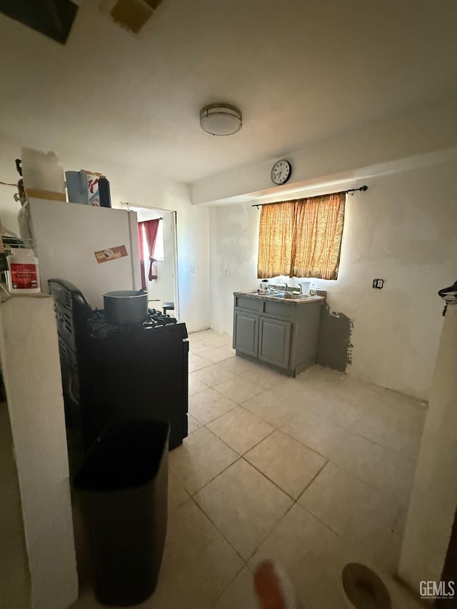 1218 Water St 0, Bakersfield, CA 93305 - kitchen featuring light tile patterned floors and gray cabinetry