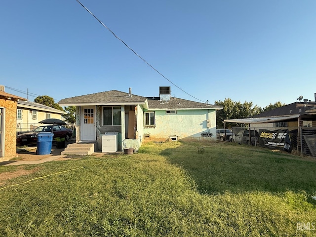 1218 Water St 0, Bakersfield, CA 93305 - back of house with a lawn, entry steps, and stucco siding