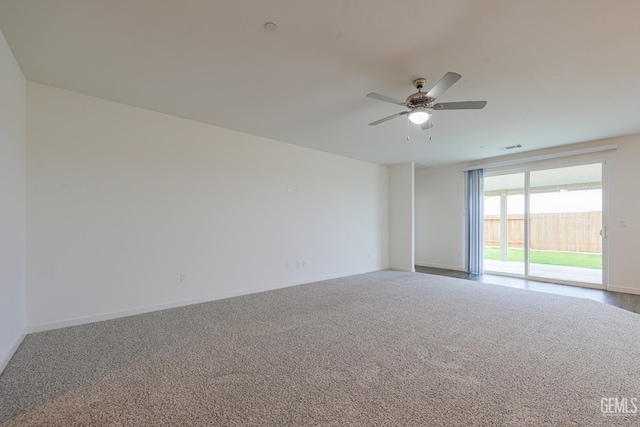 unfurnished room featuring carpet floors and ceiling fan