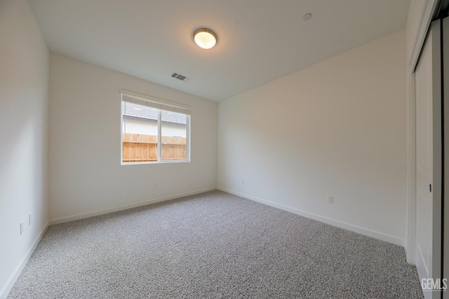 view of carpeted spare room