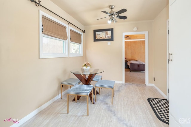 dining room featuring ceiling fan and light hardwood / wood-style floors