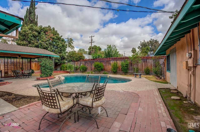 view of pool featuring a gazebo and a patio area