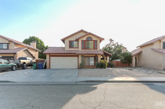 44827 Rock Island Dr, Lancaster, CA 93535 - view of front of house with driveway, stucco siding, and a tile roof