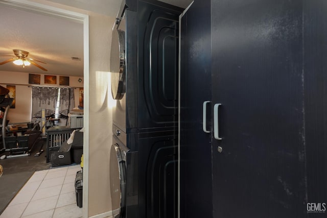 44827 Rock Island Dr, Lancaster, CA 93535 - bathroom featuring stacked washer / drying machine and a ceiling fan
