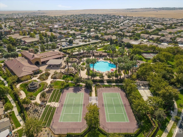 birds eye view of property with a residential view